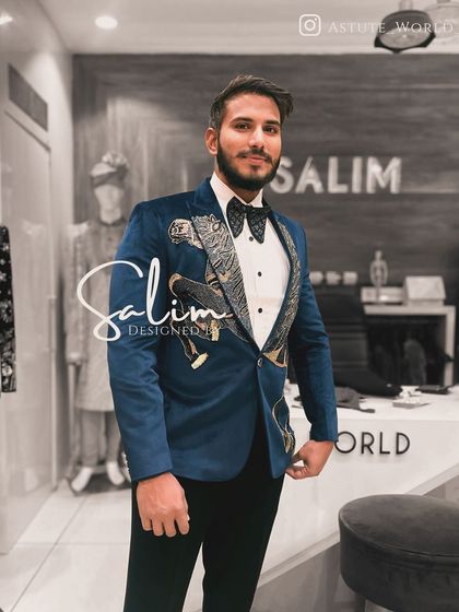 Another view of the elegant blue suede velvet tuxedo with a flying horse motif. This shows how the design wraps around the lapel for a continuous artistic statement.