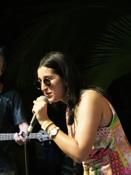 A close-up shot from our performance at The Wassup Flea. We bring our passion and energy, whether it's a hot summer day or a cool evening.