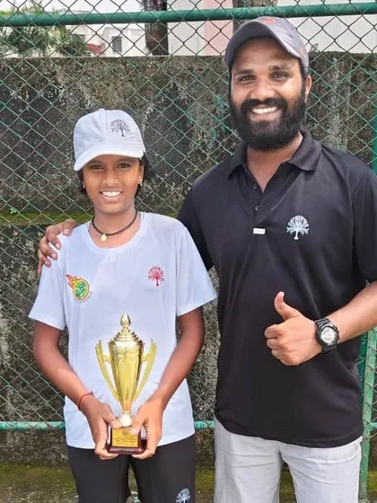Tamanna Nair with her coach after securing the Doubles Runner-up position at the U-12 All India National Series in Hyderabad.