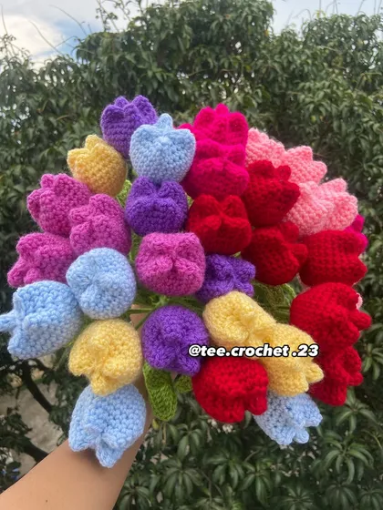 A large, mixed bouquet of colorful tulips.