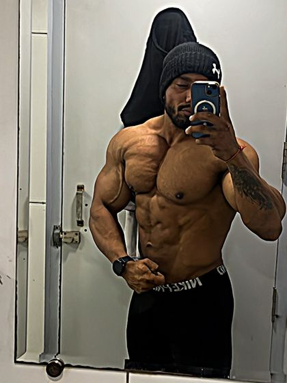 Every comeback is possible. A mirror selfie showing a lean and muscular physique.