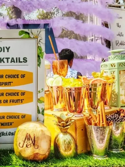 I create interactive experiences like this DIY Cocktails station. It's a great way to get guests mingling as they choose their own spirits, fresh fruits, and mixers to craft their perfect drink, guided by my expert team.