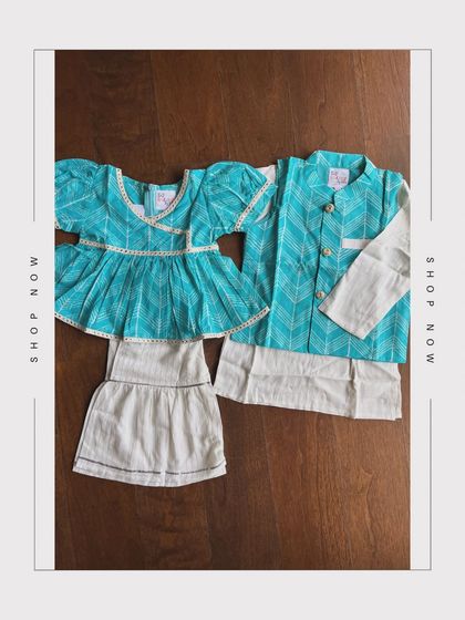 A beautiful twinning set in shades of turquoise and white. For her, a puff-sleeve top with a simple skirt. For him, a smart bandi kurta set. Both are made from the same soft, printed cotton.