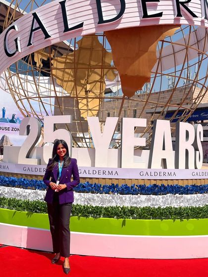 Pictured here at a booth during Dermacon 2024. These events are crucial for learning about global advancements in dermatological science.