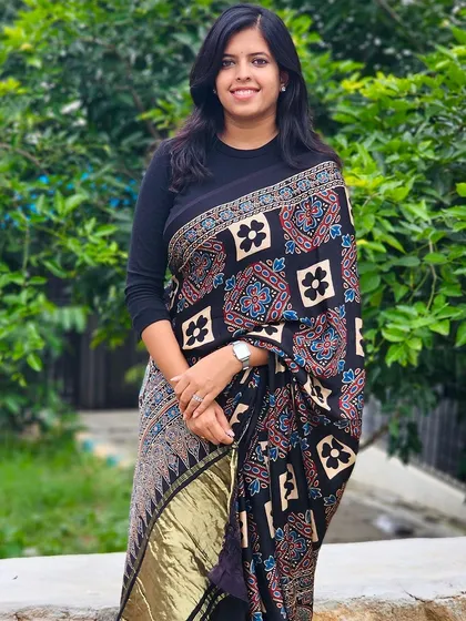 The full look of the Ajrakh saree, showcasing its elegant drape and timeless appeal. It's a perfect blend of tradition and style.