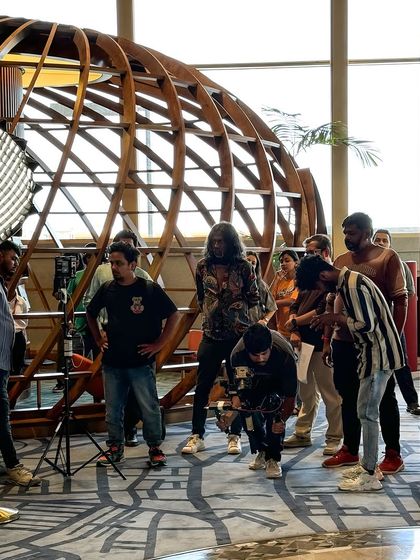 The full crew at work, setting up lighting and camera angles. It takes a big team to make an ad, and I respect and enjoy collaborating with every department.