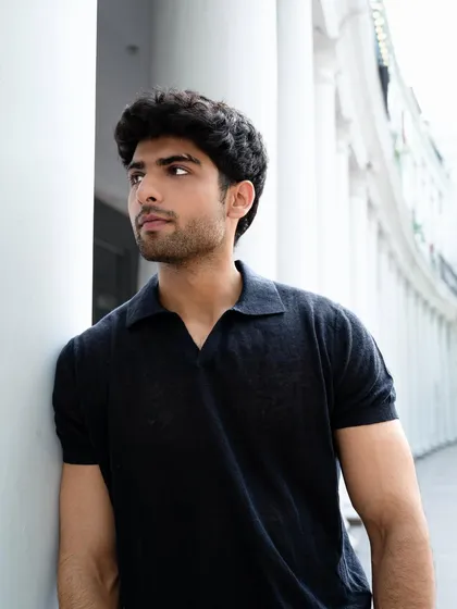 A three-quarter portrait capturing a thoughtful expression. We direct models to deliver a variety of poses and moods to build a well-rounded and versatile portfolio.