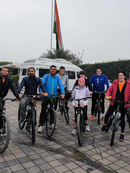 The full group, energized and ready to ride on the Krishna's Trails tour. With our guides and support van, everyone can enjoy the journey at their own pace.