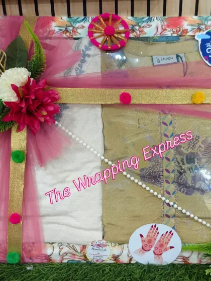 Festivals like Teej are all about gifting. I prepare these beautiful trousseau trays with suits, henna, and other shagun items, decorated with traditional motifs to match the festive spirit.