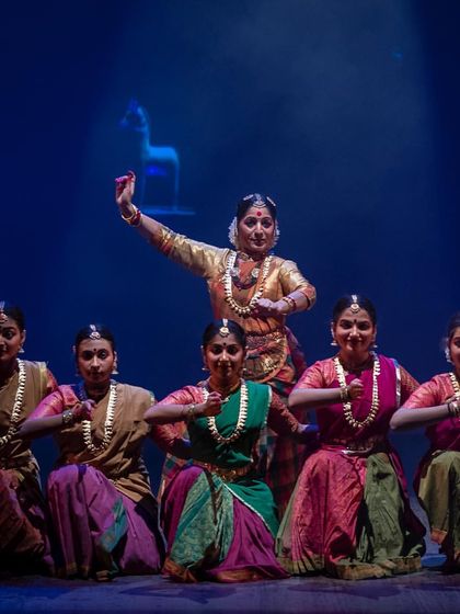 A beautiful tableau from 'Antariksha Sanchar' depicting Surya, the Sun God, and his celestial horses. The backdrop of animated visuals adds a layer of mythology and magic to the scene.