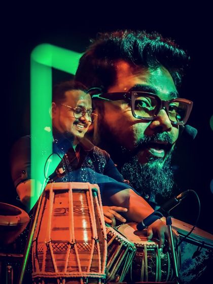 A creative double-exposure shot of our percussionist at the Berger Paints event, capturing the rhythm and soul of his performance.
