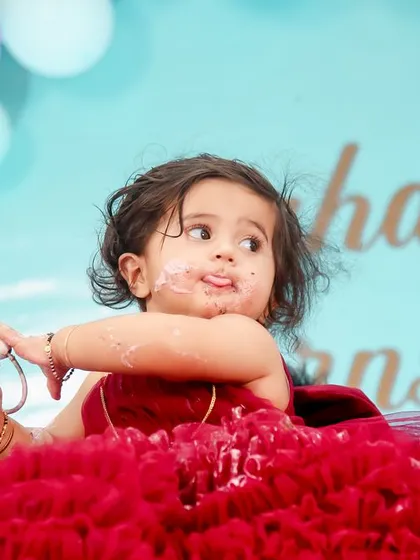 The iconic first birthday cake smash! We make sure to capture every sweet and messy moment as your little one dives into their first cake. This shot, filled with pure delight, is a memory this family will laugh about and cherish for years.