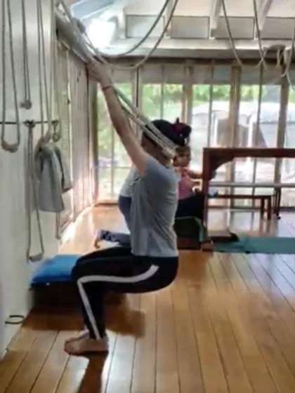 Taking the first step toward healing can be as simple as using a rope wall. This allows the student to decompress the spine and open the shoulders without any weight on the joints, making it a safe and effective exercise for those with back or neck pain.