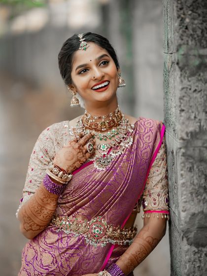 The complete royal bridal look for Bhuvana. Her makeup, hair, and styling all came together to create this unforgettable muhurtham look.