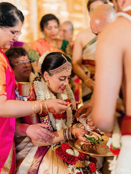 Another ceremony shot, showing the durability and beauty of the makeup during traditional rituals.