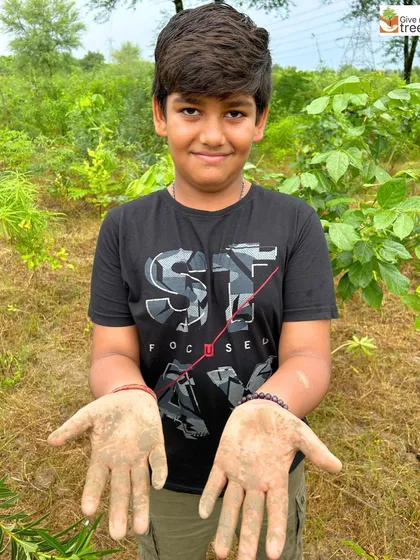 The best way to learn about nature is to get your hands dirty. This is the moment a young volunteer truly connects with the earth, a memory that will stay with him and grow into a lifelong respect for the environment. This is what our work is all about.
