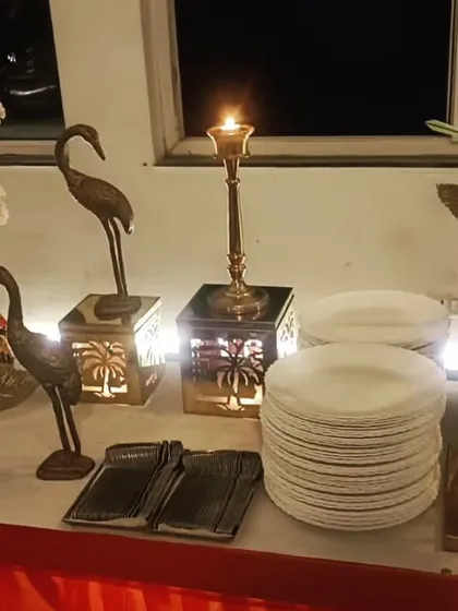 A festive setup for a Dhanteras party for 120 guests in South Ex. The elegant decor and candle stands add a warm, celebratory glow to the evening.