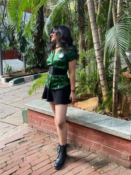 Representing my music collective at a 'Raw and Real' acoustic event. This photo shows me supporting other talented artists in an unplugged setting.