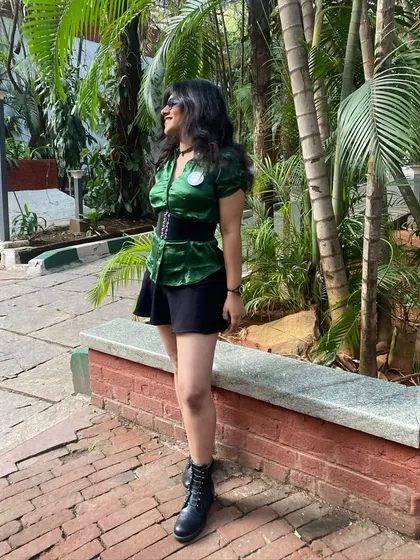 Representing my music collective at a 'Raw and Real' acoustic event. This photo shows me supporting other talented artists in an unplugged setting.