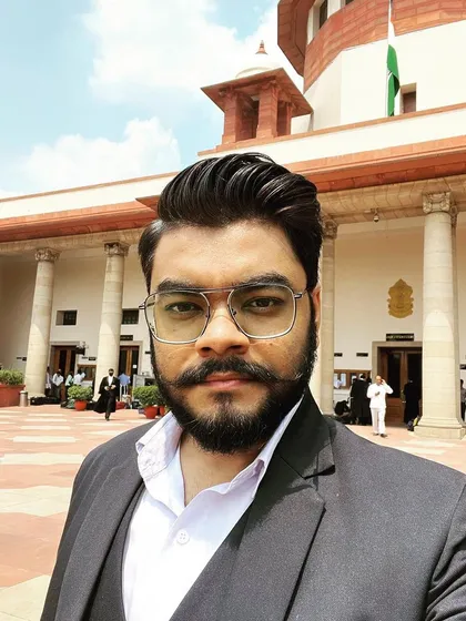 Outside the main building of the Supreme Court. I believe in being respectful and humble, but firm when representing my clients in these halls of justice.