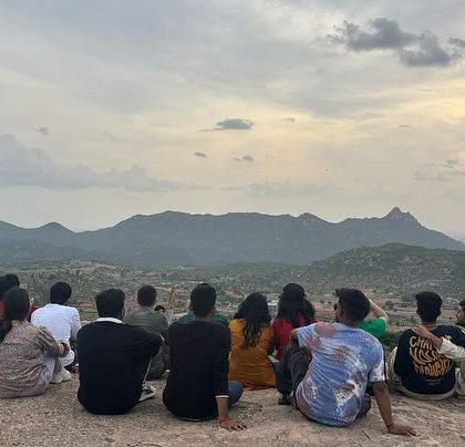 Watching the sunset over the hills on our Adiyogi day trip. A perfect, peaceful end to a day of exploration.