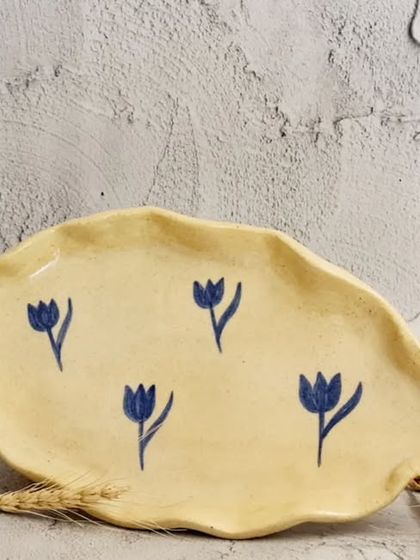 This small, hand-formed serving dish with a hand-painted lotus pattern is perfect for serving small bites, sushi, or even as a jewelry dish. Limited pieces are available on my website.