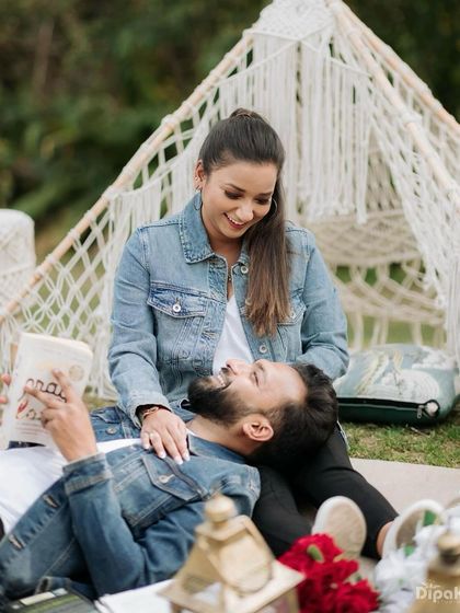 A playful and happy moment. The makeup is fresh and light, letting her natural joy shine through.