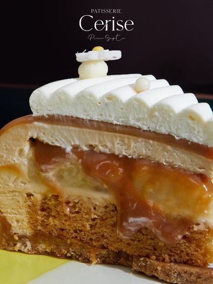 Another look at the layers of the Karamella, an exquisite entremet that brings together caramel, ripe bananas, and vanilla.