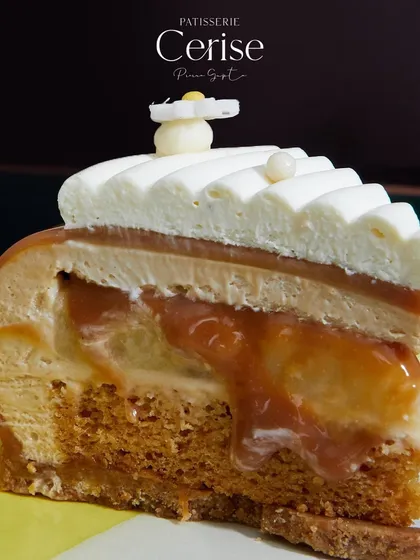 Another look at the layers of the Karamella, an exquisite entremet that brings together caramel, ripe bananas, and vanilla.
