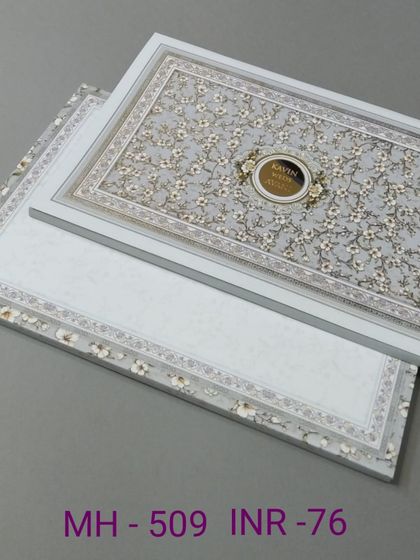 A simple and elegant invitation with a grey floral pattern and a clean white border. The design is understated and sophisticated.