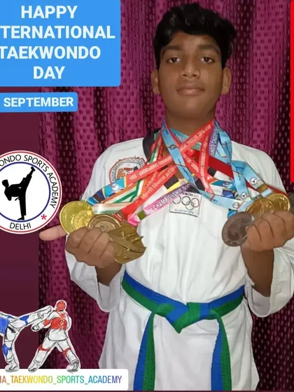 Vansh Kumar Taank with a handful of medals, representing his hard work and the success of our training program.