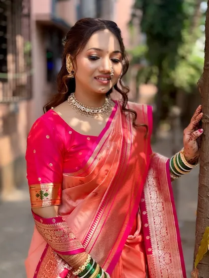 Another angle of this beautiful engagement saree look, showing how the makeup and hair come together perfectly with the outfit.