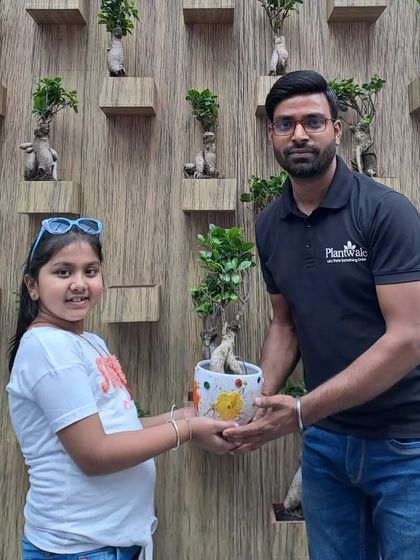 A Plantwale team member engaging with the community during a greening event at Pacific Mall. We enjoy sharing our passion for plants and educating others on the benefits of going green.