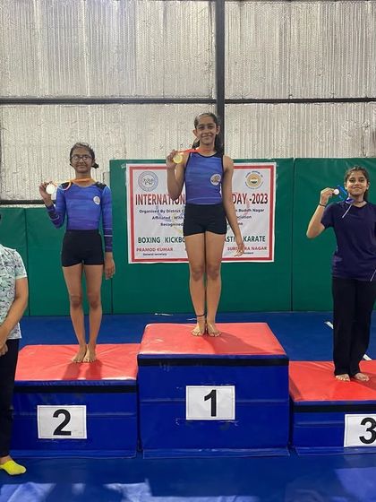 Winners on the podium at the District Level competition on World Olympic Day.