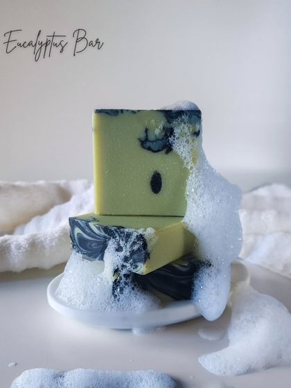 My Eucalyptus Bar, covered in rich, bubbly lather. This soap provides a refreshing and invigorating cleanse, perfect for waking up your senses while nourishing your skin with plant-based ingredients.