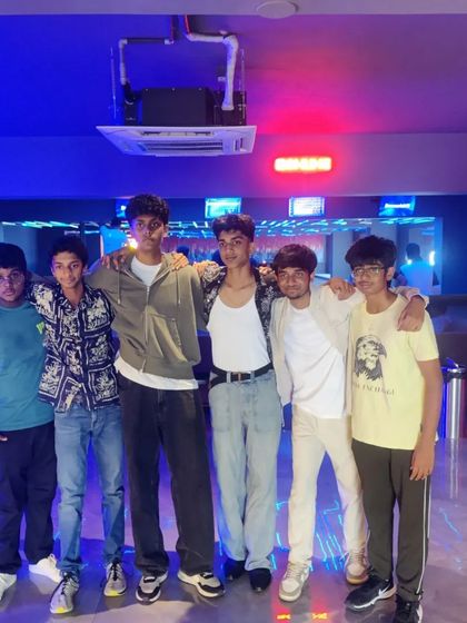 A group of young guys hanging out at The Grid.