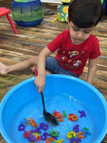 Fishing for letters! This water-based activity is a hit with the kids and helps them with alphabet recognition in a playful, sensory way.