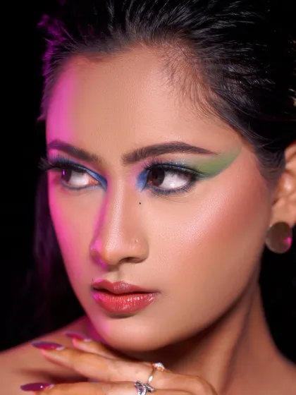 A creative editorial look with graphic colorful eyeliner. This is the kind of artistic expression we encourage and teach in our advanced courses.