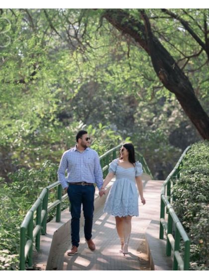 Love is in the air. A casual stroll in the park for this couple shows that the journey together is made of simple, happy moments.