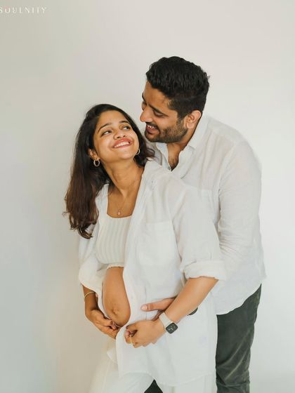 The look they share is full of love, excitement, and a beautiful future. A simple and sweet moment captured in the studio.