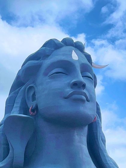 A close-up of the Adiyogi statue, capturing its peaceful and powerful expression. A perfect place for meditation and reflection.
