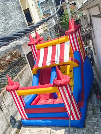 Another angle of the circus tent slide, showing its tall and narrow profile which can be useful for venues with limited width.