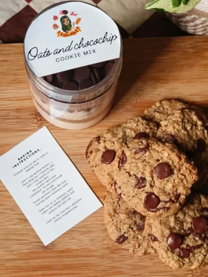 The Oats and Choco-chip Cookie Mix from my 'Santa's Warm Hug Trio'. This jar contains all the dry ingredients you need to bake delicious, homemade cookies, complete with simple instructions for a fun and easy baking experience.