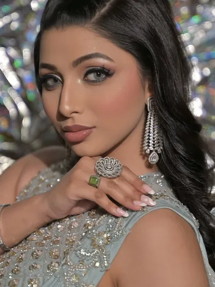 A close-up focusing on the accessories and the sharp, defined makeup that complements them perfectly.