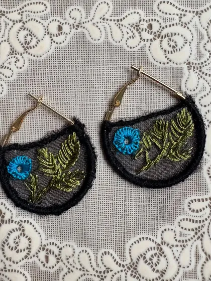 This is a project made by one of my talented students. After learning freestyle embroidery, she created this stunning pair of embroidered earrings on sheer fabric for her daughter.