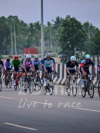 The peloton stretches out along the highway, a beautiful sight for any cycling enthusiast.
