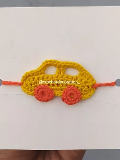 A yellow car wristband, perfect for little vehicle enthusiasts. Like all our wristbands, it's handmade with soft, child-friendly yarn.