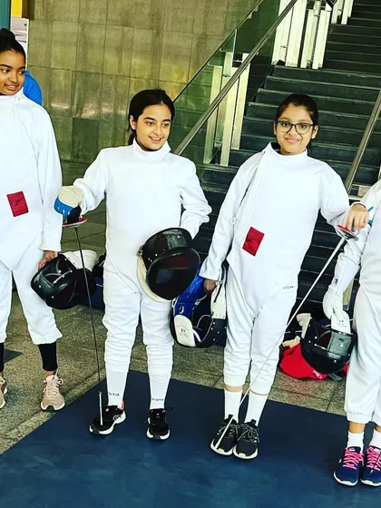 Our girls' team, all smiles and ready to compete at the Delhi State Fencing Championship. Confidence is the first step to victory.
