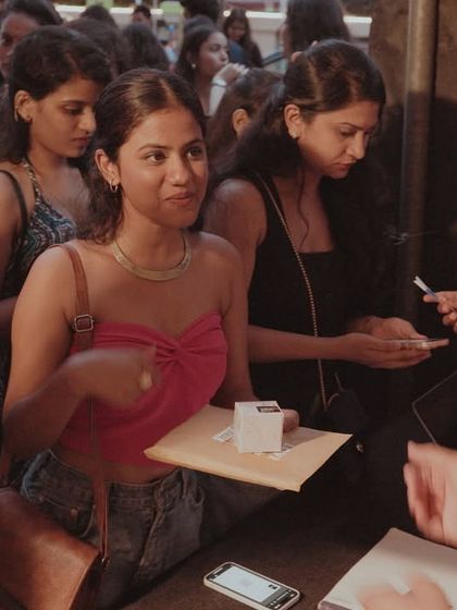 The check-in process at a major concert. My team manages all aspects of event entry, ensuring a smooth and efficient experience for thousands of attendees from the moment they arrive.