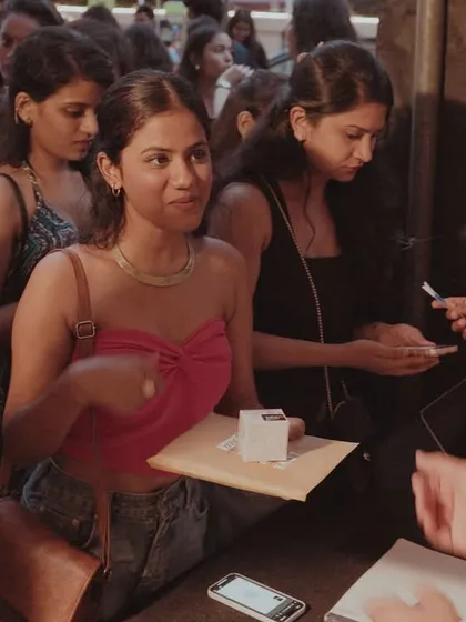 The check-in process at a major concert. My team manages all aspects of event entry, ensuring a smooth and efficient experience for thousands of attendees from the moment they arrive.